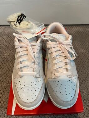 Nike Women’s Low-Top Sneakers in Pale Pink and White
